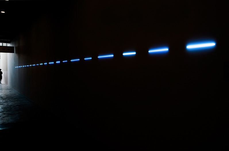 rushing_across_the_field_as_a_dotted_line_neon