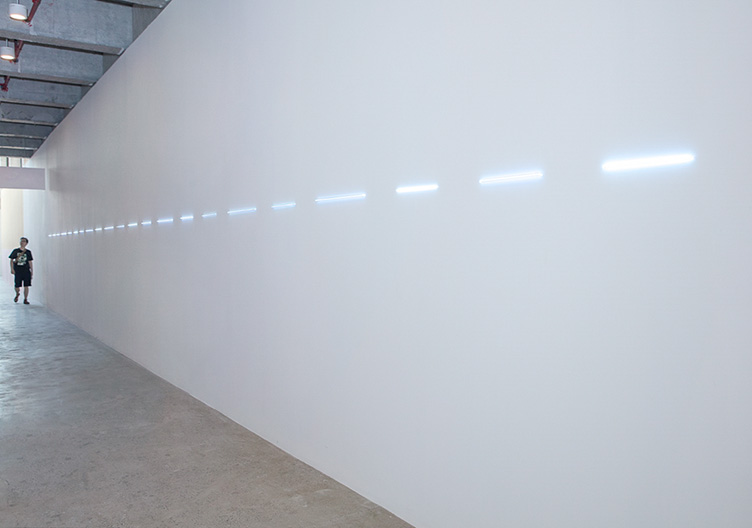 rushing_across_the_field_as_a_dotted_line_neon